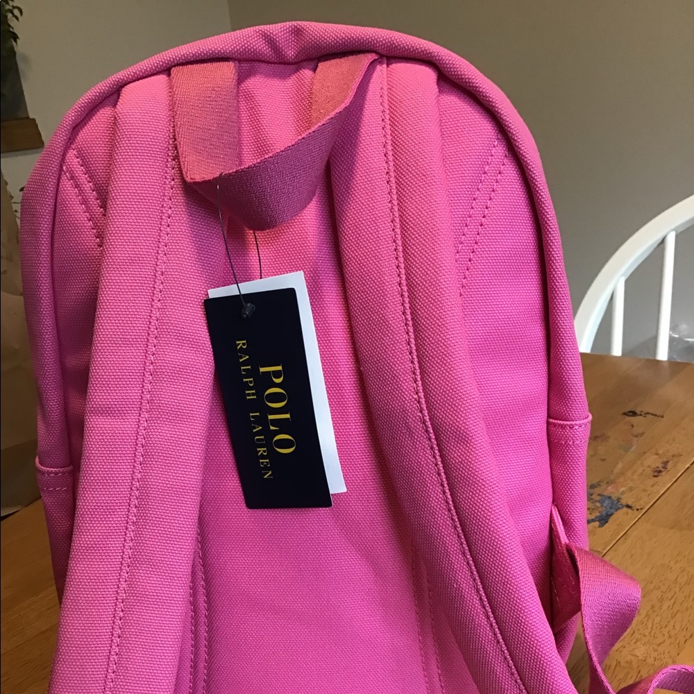 New with Tags Small Pink Polo Backpack! 1 Large and 2 small pocket on the inside